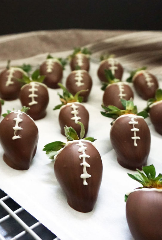 Chocolate-covered strawberry footballs