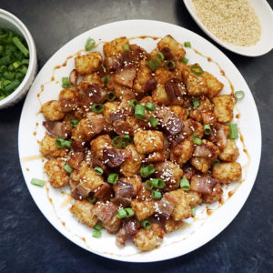 Asian pork belly loaded tater tots from @bijouxandbits