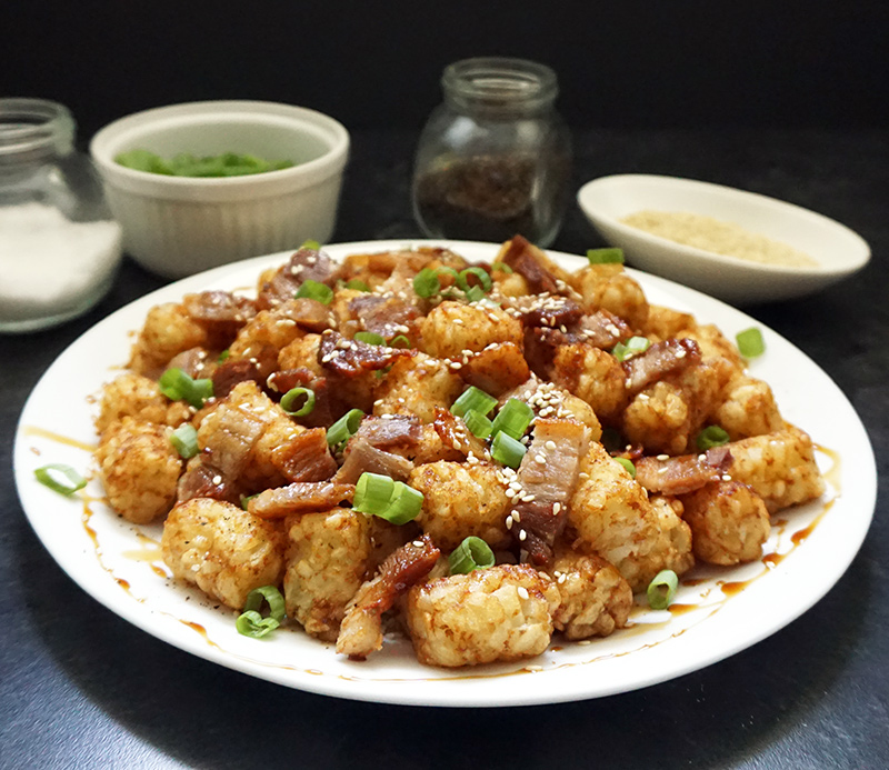 Asian pork belly loaded tater tots from @bijouxandbits