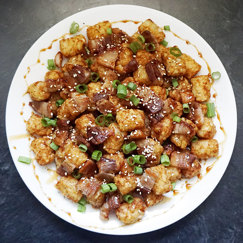 Asian pork belly loaded tater tots from @bijouxandbits